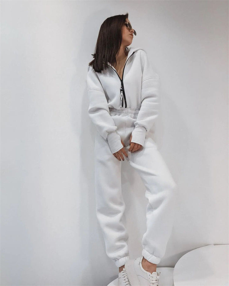 Damen Taillierter Kapuzen-Sweat-Jumpsuit mit Reißverschluss und elastischem Taillenbund – Solévia