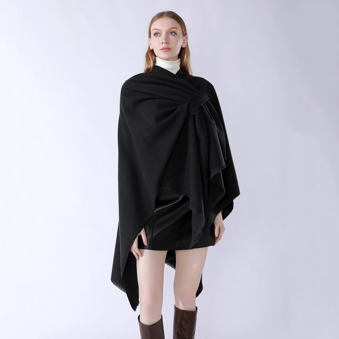 Damen Strickponcho mit geometrischem Blockmuster und Fransen Echo Archiv