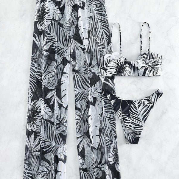 Damen Badeoutfit mit floralem Oberteil und transparenten Palazzohosen Echo Archiv