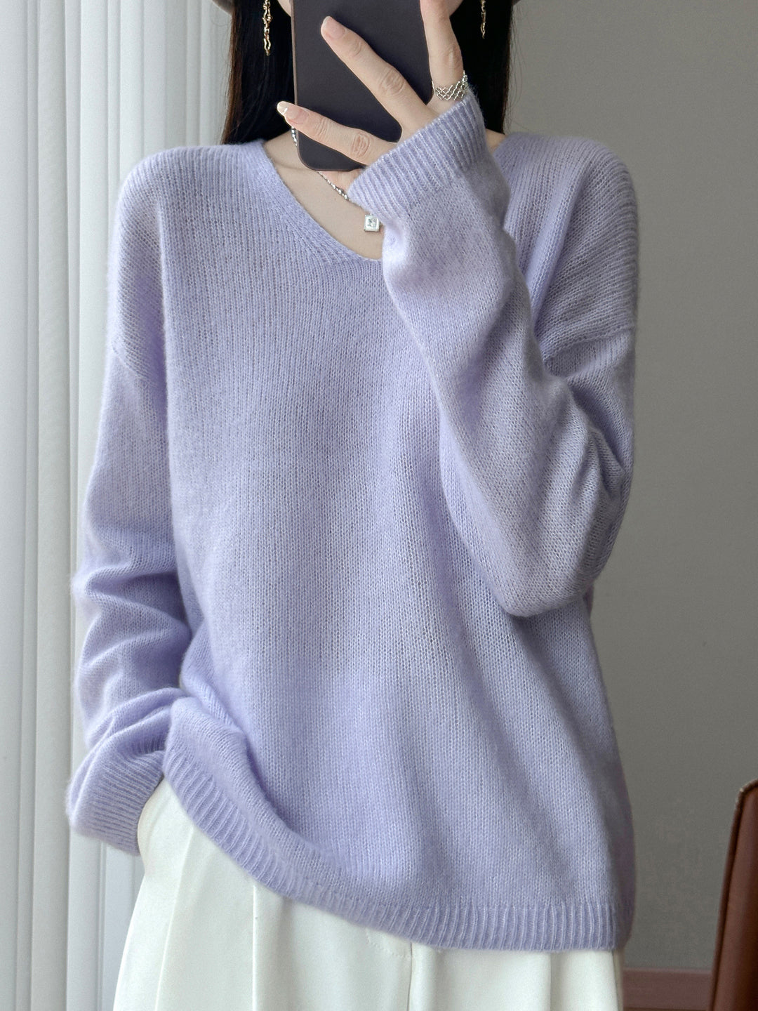 Damen Oversize-Feinstrickpullover mit feinem V-Ausschnitt und verlängertem Ärmelabschlusst Echoarchiv