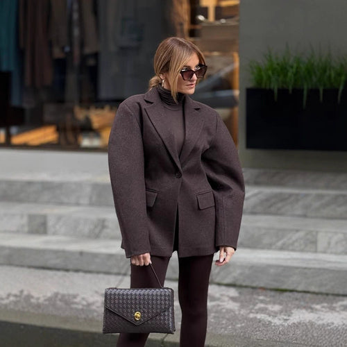 Damen Oversize-Strukturblazer mit betonter Schulterpartie und voluminösen Ärmeln Echoarchiv
