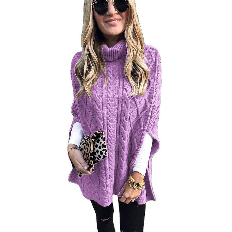 Damen nan kastiger Strickponcho mit hohem Rollkragen, Zopfstruktur und seitlichen Schlitzen Echo Archiv