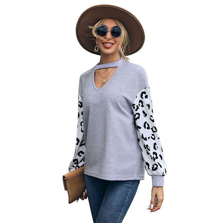 Damen Lässiger Pullover mit Leopardenärmel Echo Archiv