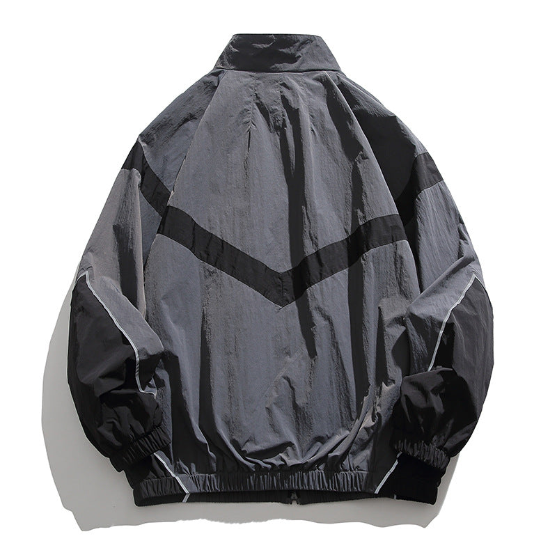 [Unisex] Oversize technische Wind- und Regenjacke mit Stehkragen, reflektierenden Paspeln und elastischem Saum Echo Archiv