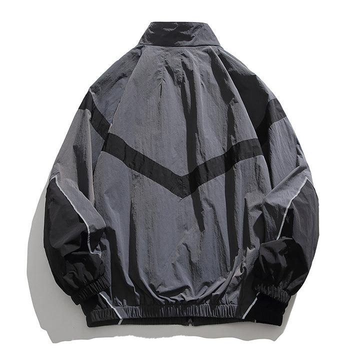 [Unisex] Oversize technische Wind- und Regenjacke mit Stehkragen, reflektierenden Paspeln und elastischem Saum Echo Archiv