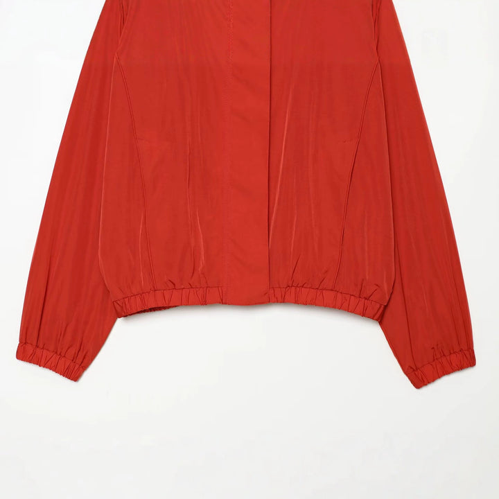 Damen Leichter Technical Windbreaker‑Blouson mit hohem Stehkragen, verdecktem Reißverschluss und elastischem Saum Echo Archiv