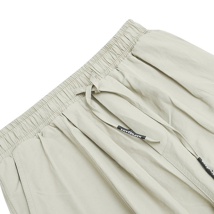 Unisex Weite Harem-Hose mit Kordelzugbund, elastischen Beinabschlüssen und Oversize-Silhouette Echo Archiv
