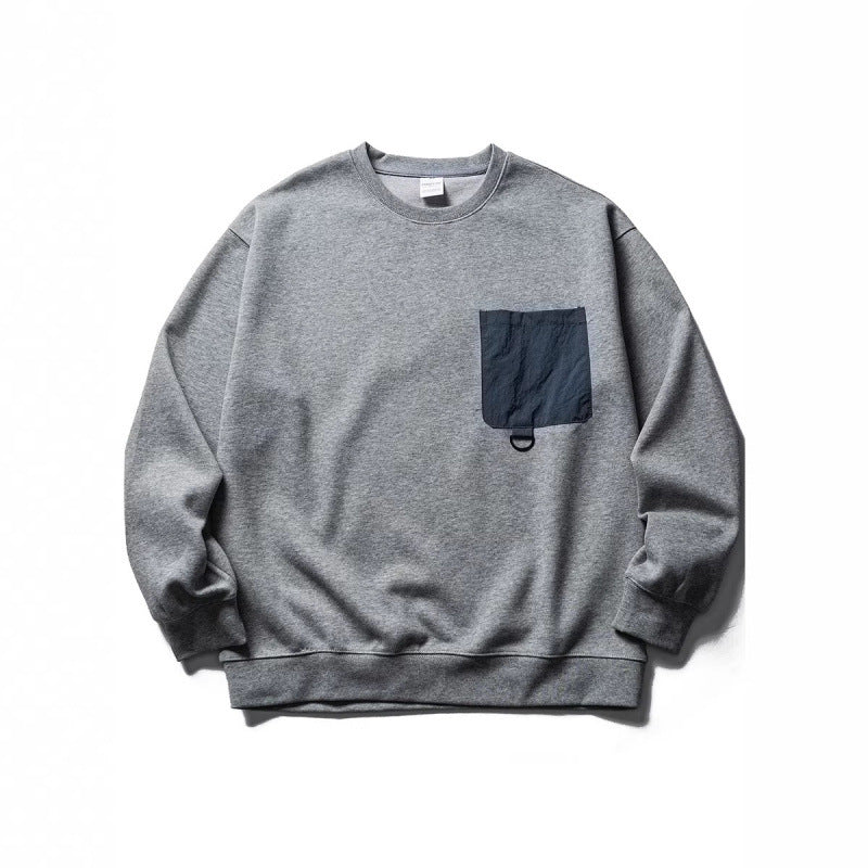 Unisex Oversize-Sweatshirt mit kontrastierender Brusttasche und D-Ring Echo Archiv