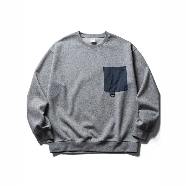 Unisex Oversize-Sweatshirt mit kontrastierender Brusttasche und D-Ring Echo Archiv