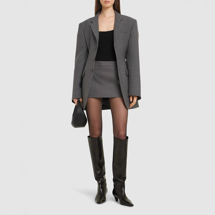 Damen Oversize-Blazer mit langer Silhouette und markanter Schulterpartie Echoarchiv