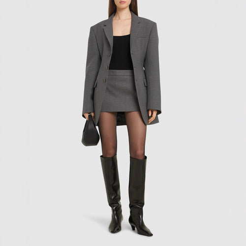 Damen Oversize-Blazer mit langer Silhouette und markanter Schulterpartie Echoarchiv