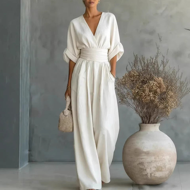 Echoarchiv | Eleganter Ärmelloser Jumpsuit mit Tiefem V-Ausschnitt, Taillenbund und Weitem Bein