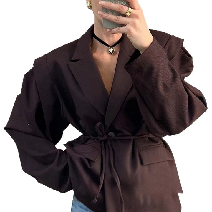 Damen nan taillierter Blumenblazer mit Bindegürtel und Reverskragen Echo Archiv