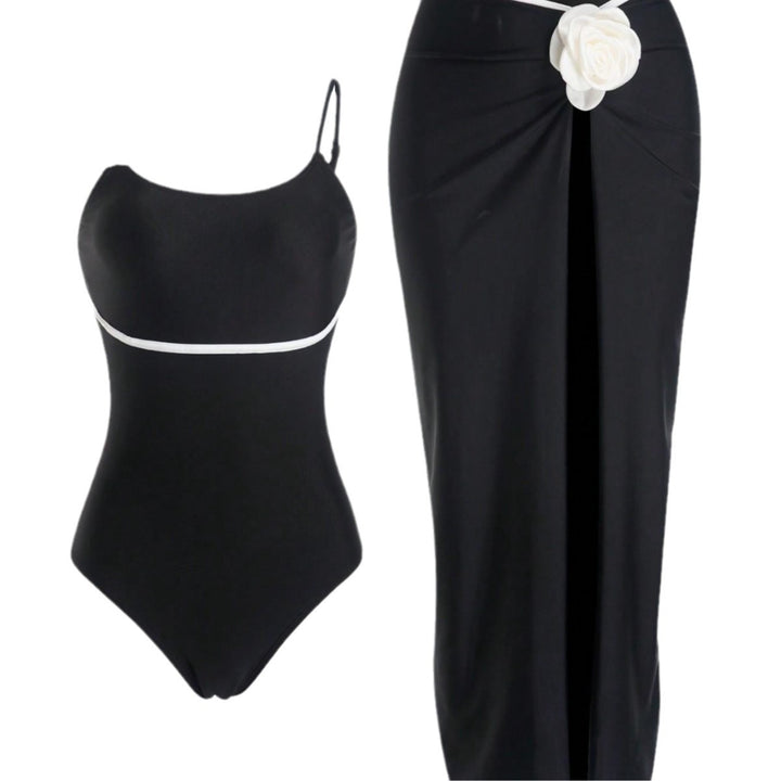 Damen Einteiler Badeanzug mit elegantem Rock und verspielten Blütendetails Echo Archiv