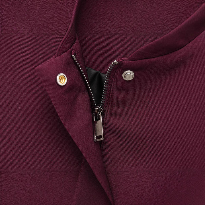 Damen kurze Stehkragen-Blousonjacke mit verdeckter Frontleiste, taillierter Rippbund-Details und dekorativen Paspeltaschen – Célinea