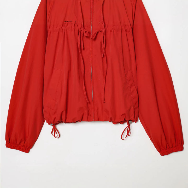 Damen kurzer Kapuzen-Windbreaker mit Tunnelzug, Reißverschluss und elastischem Saum – Célinea