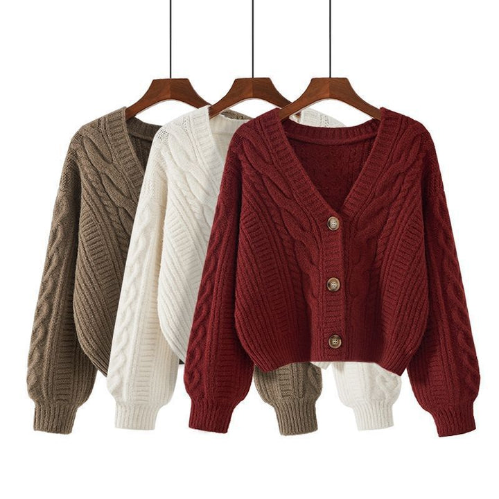 Damen Strickjacke mit ausgefallenem Zopfmuster und tiefem V-Ausschnitt Echoarchiv