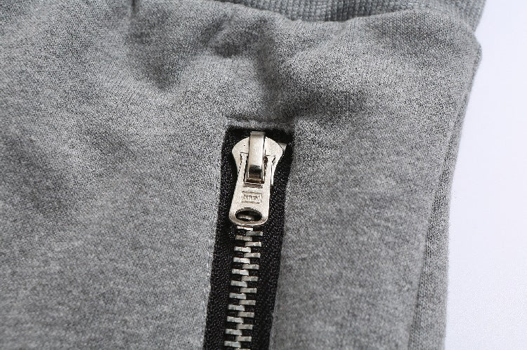 Herren Sportliche Jogginghose im modernen Design mit seitlichen Reißverschlüssen Echoarchiv