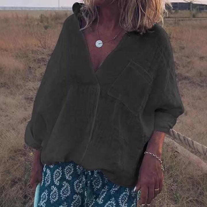 Damen Oversized Leinen-Look Bluse mit tiefem V-Ausschnitt, aufgesetzter Brusttasche und hochgerollten Dreiviertelärmel – Élovi