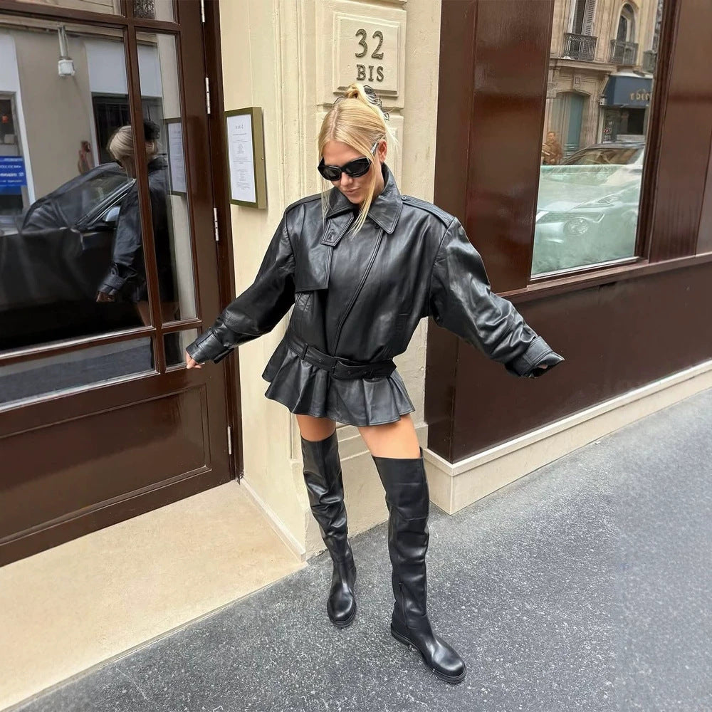 Damen Oversize-Lederjacke mit taillierendem Bindegürtel und Volant-Saum Echoarchiv