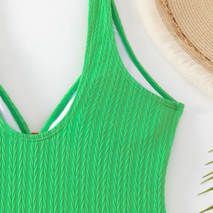 Damen One-Piece Badeanzug mit elegantem Holzring-Design Echo Archiv