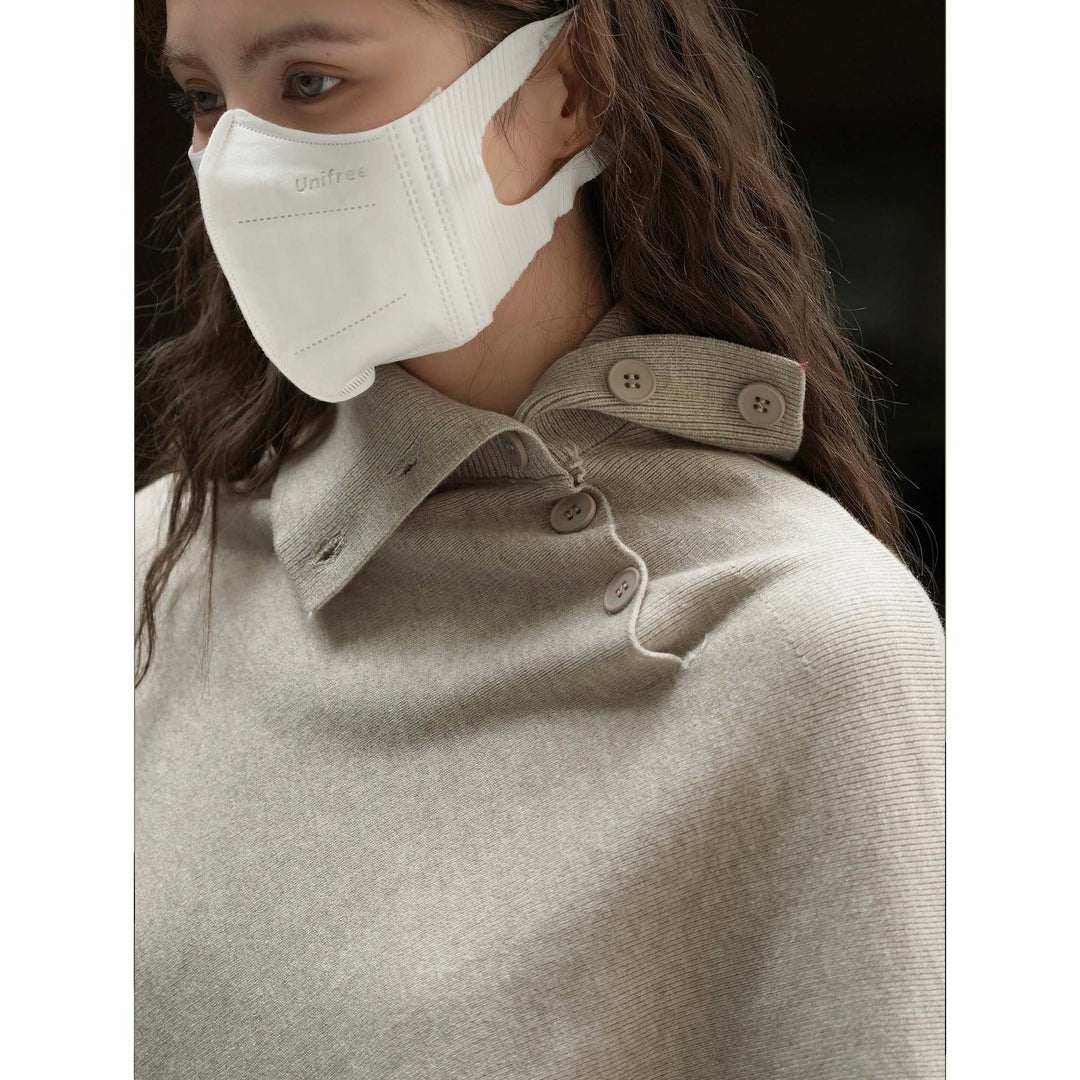 Damen Asymmetrisches Strickponcho mit Knopfkragen und Oversize-Silhouette Echoarchiv