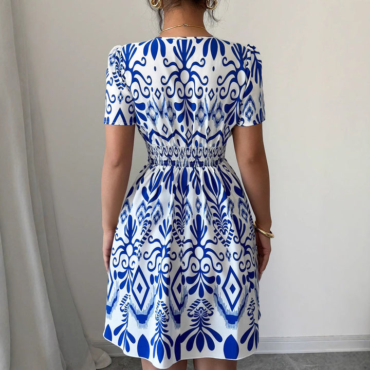 Damen Sommerliches Mini-Kleid mit elegantem V-Ausschnitt und floralen Mustern Echo Archiv