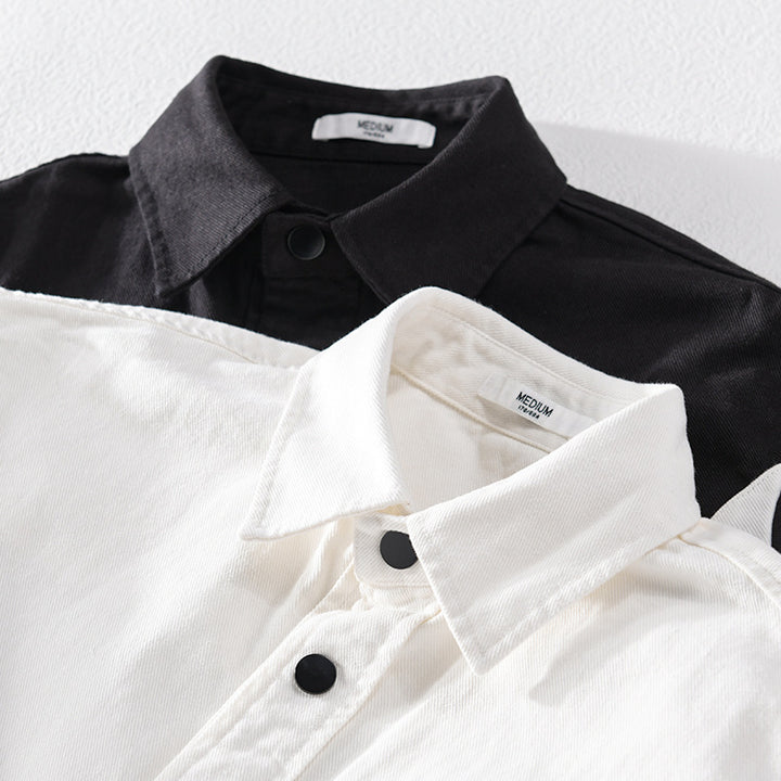 Herren Baumwoll-Overshirt im Layering-Stil mit geometrischen Colorblock-Einsätzen und Druckknopf-Leiste Echoarchiv