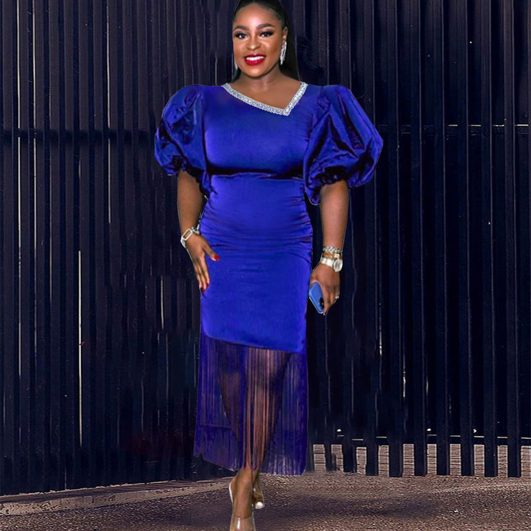 Damen figurbetontes Kleid mit voluminösen Puffärmeln und Fransen Echo Archiv