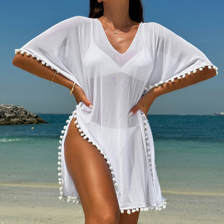 Damen Strandkleid mit dekorativem Pompon-Besatz und elegantem V-Ausschnitt Echo Archiv