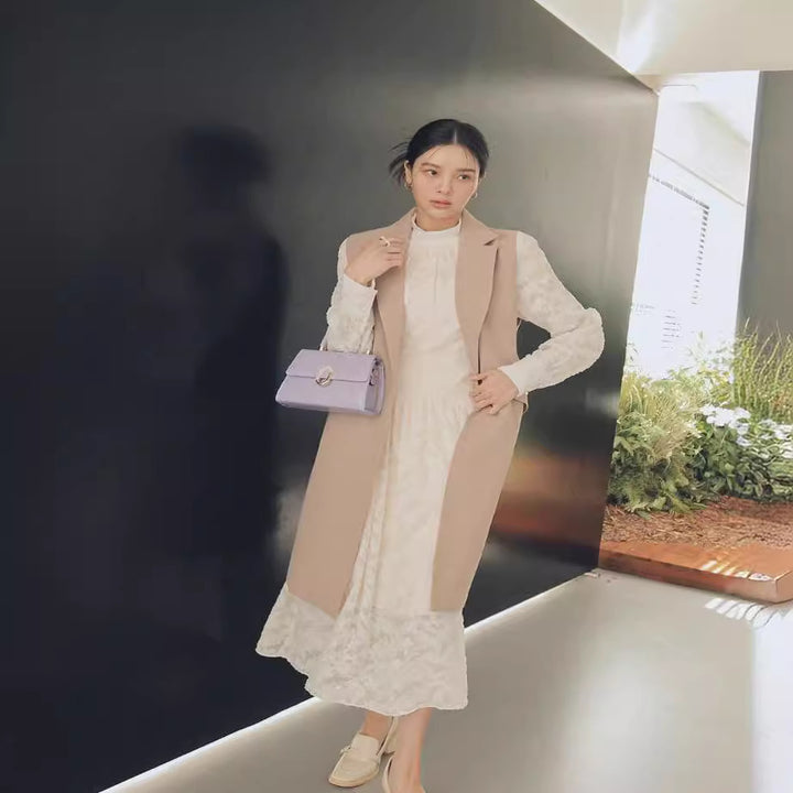 Damen Ärmellose Longweste im Tailoring mit Pattentaschen und einreihiger Knopfleiste Echoarchiv