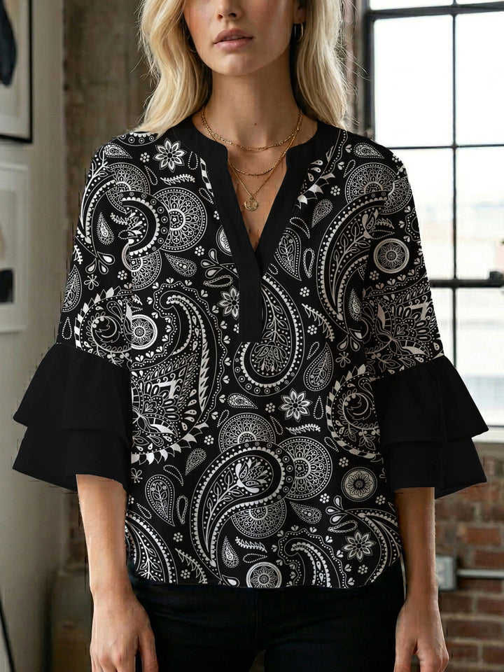 Damen Bluse mit voluminösen Flügelärmel und intensivem Blattmuster Echo Archiv