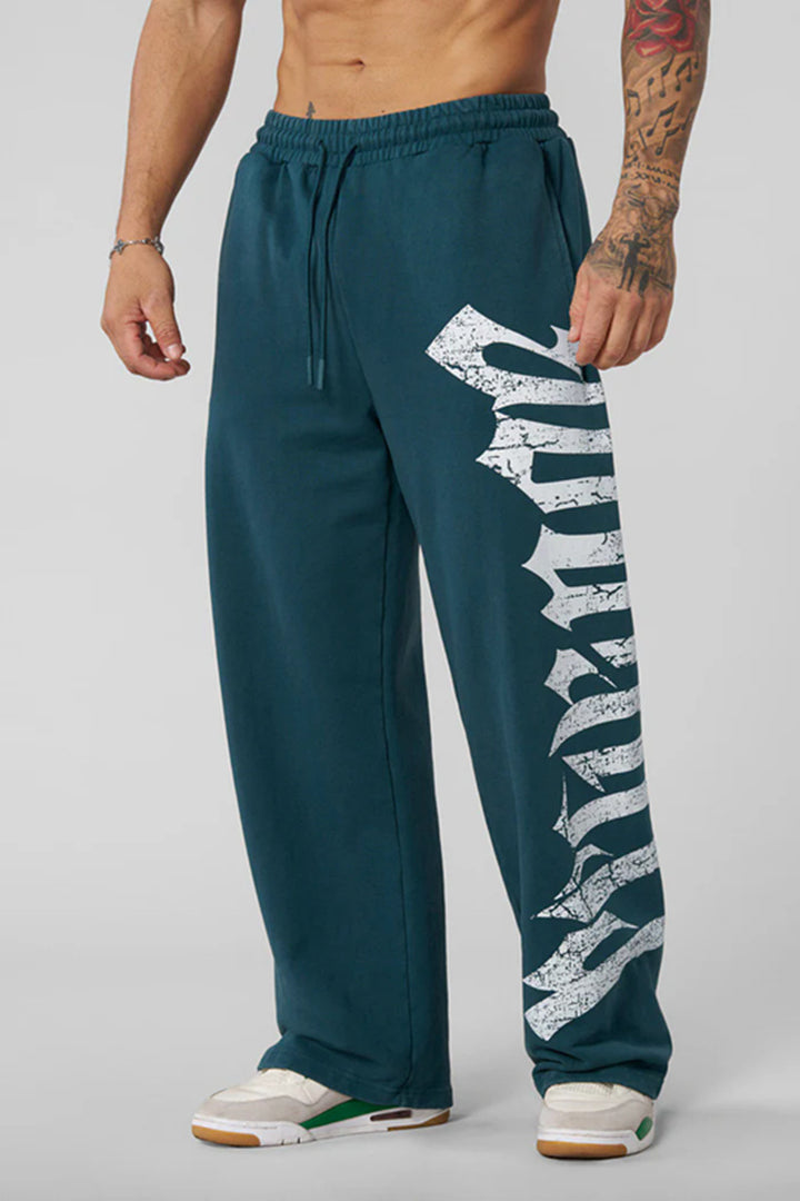 Herren nan weite Sweathose aus angerautem Fleece mit seitlichem Vintage-Print und Kordelbund Echo Archiv