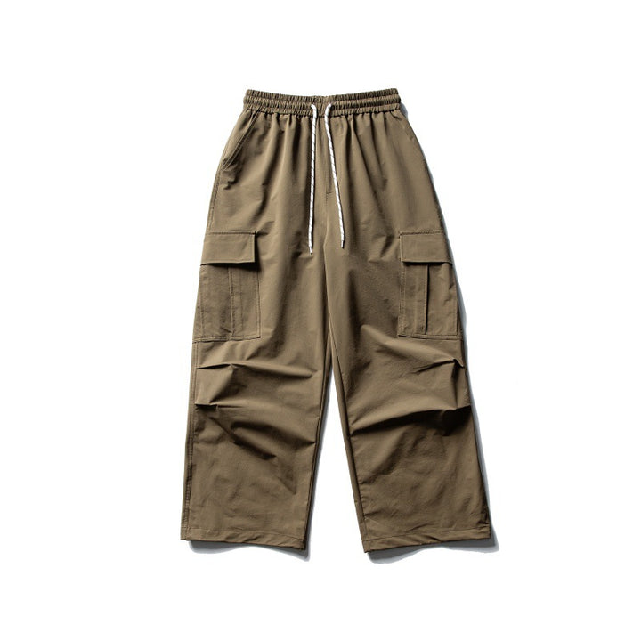 Unisex Weite Cargo-Utility-Hose im Baggy-Schnitt mit elastischem Kordelbund und großzügigen Klappentaschen Echoarchiv