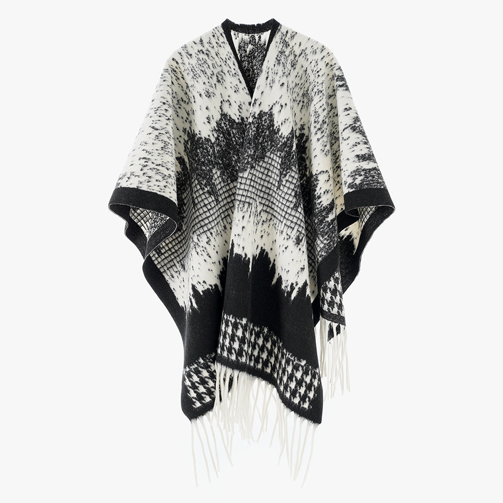 Damen Monochromer Jacquard-Capeponcho aus Wollmix mit Fransen und Oversize-Fall Echo Archiv