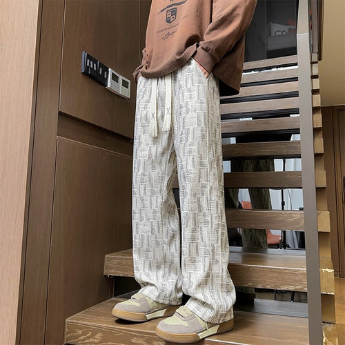 Herren Weite Strukturierte Leinenoptik-Hose mit Relaxed-Silhouette und grafischem Muster Echoarchiv