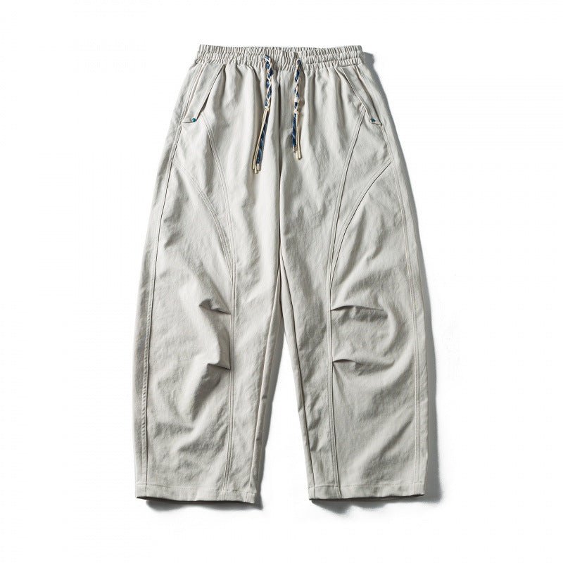 Unisex Weite Cropped-Hose mit Tunnelzug, elastischem Bund und markanten Nahtpaneelen Echo Archiv