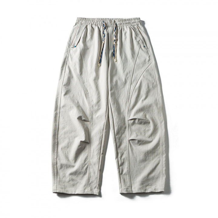 Unisex Weite Cropped-Hose mit Tunnelzug, elastischem Bund und markanten Nahtpaneelen Echo Archiv