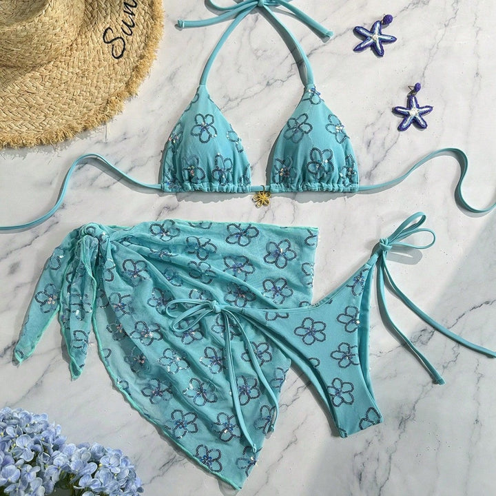 Damen blütenverzierter Bikini mit farbenfrohem Überrock Echo Archiv