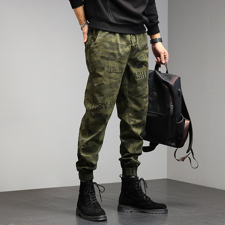 Herren Camouflage-Joggerhose mit Tunnelzug, elastischen Bündchen und Statement-Prints Echo Archiv