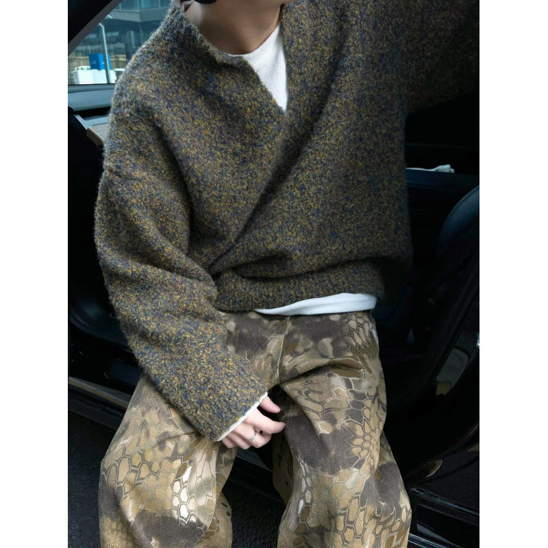 Herren Melangé Grobstrick-Pullover mit V-Schlitz und lockerem Oversize-Schnitt Echoarchiv