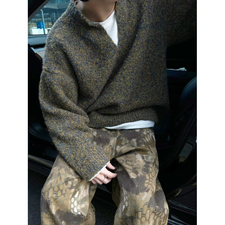 Herren Melangé Grobstrick-Pullover mit V-Schlitz und lockerem Oversize-Schnitt Echoarchiv