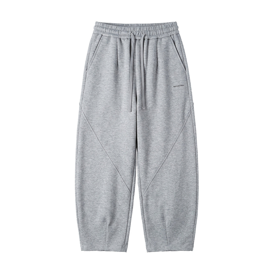 Herren Locker geschnittene Jogginghose mit Tunnelzug, Zierrnähten und Eingrifftaschen Echoarchiv