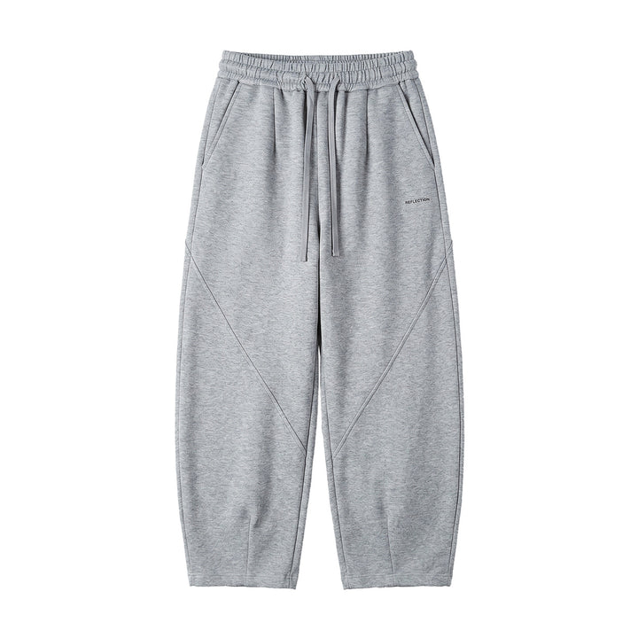 Herren Locker geschnittene Jogginghose mit Tunnelzug, Zierrnähten und Eingrifftaschen Echoarchiv