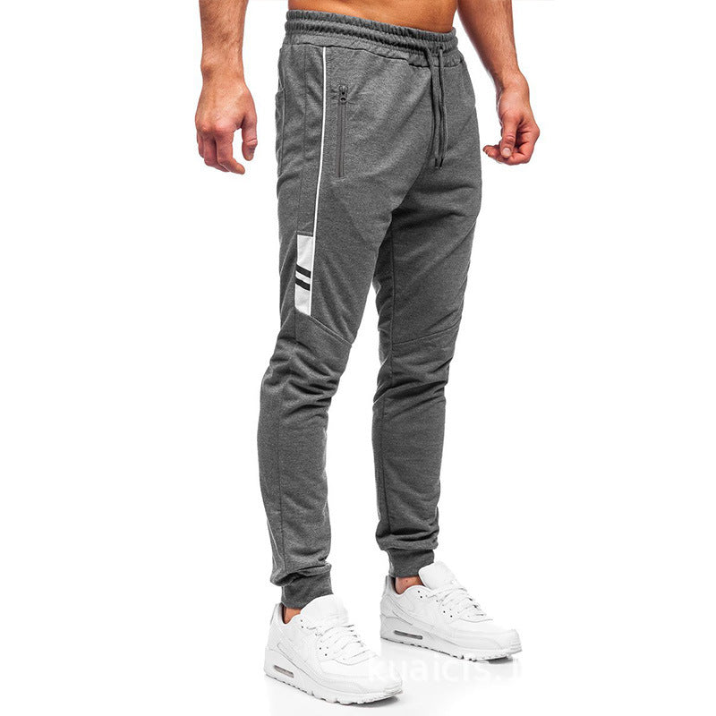 Herren Sportliche Jogginghose mit seitlichen Reißverschlüssen und elastischem Bund Echoarchiv