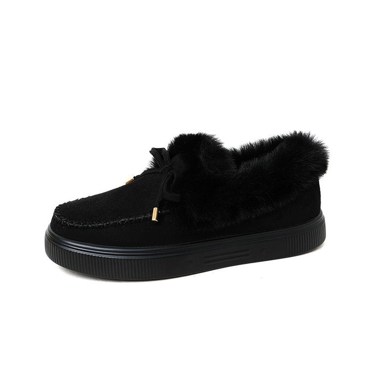 Damen Kuschel‑Mokassin‑Slipper mit hochfloriger Fellmanschette, dekorativer Steppnaht und leichtem Plateau‑Sohlenprofil Echo Archiv