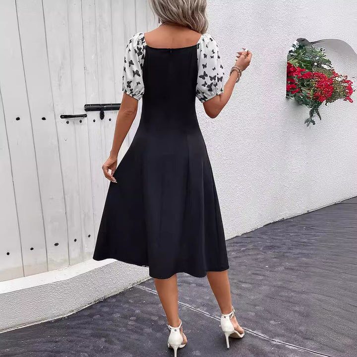 Damen Maxikleid mit Puffärmeln und Schmetterlingsmuster Echo Archiv