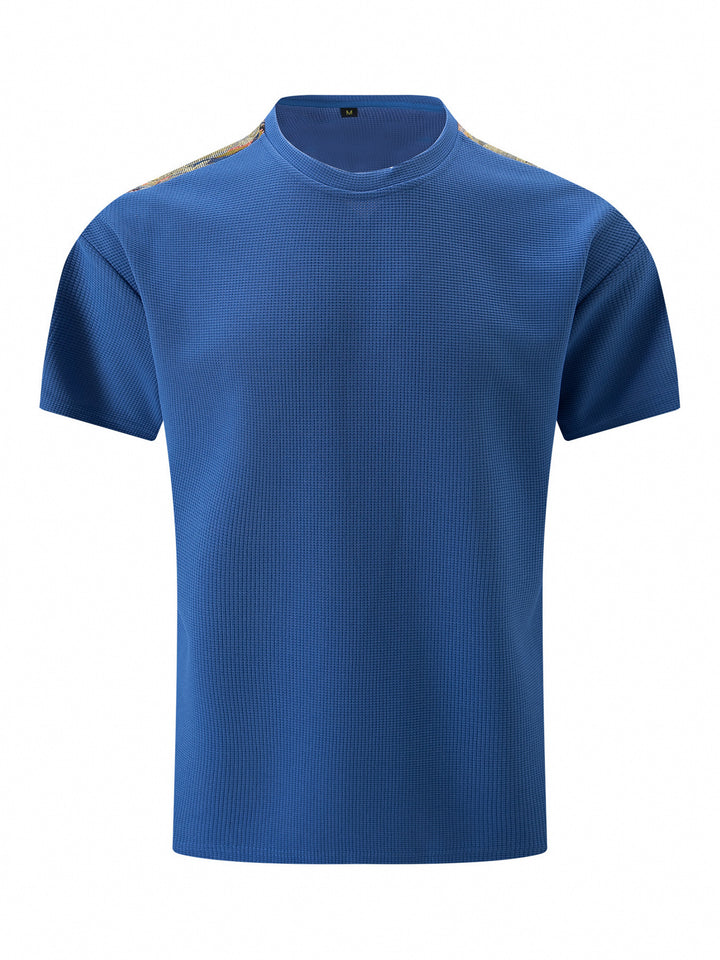 Herren atmungsaktives Kurzarm-T-Shirt mit strukturiertem Design und modernen Akzenten Echoarchiv