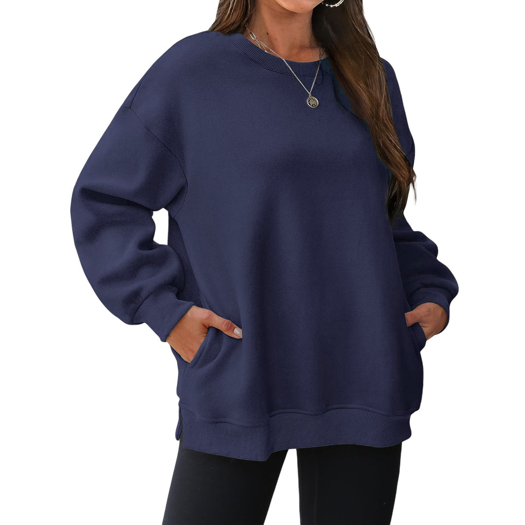 Damen verlängertes Oversize Rundhalspullover mit seitlichen Eingrifftaschen, Rippbündchen und überschnittener Schulter – Mavelle
