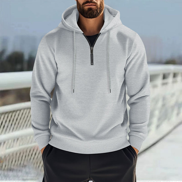 Herren Sportlicher Kapuzenpullover mit kurzem Reißverschluss und atmungsaktiven Einsätzen Echoarchiv